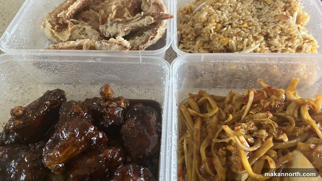 Four containers of takeout food