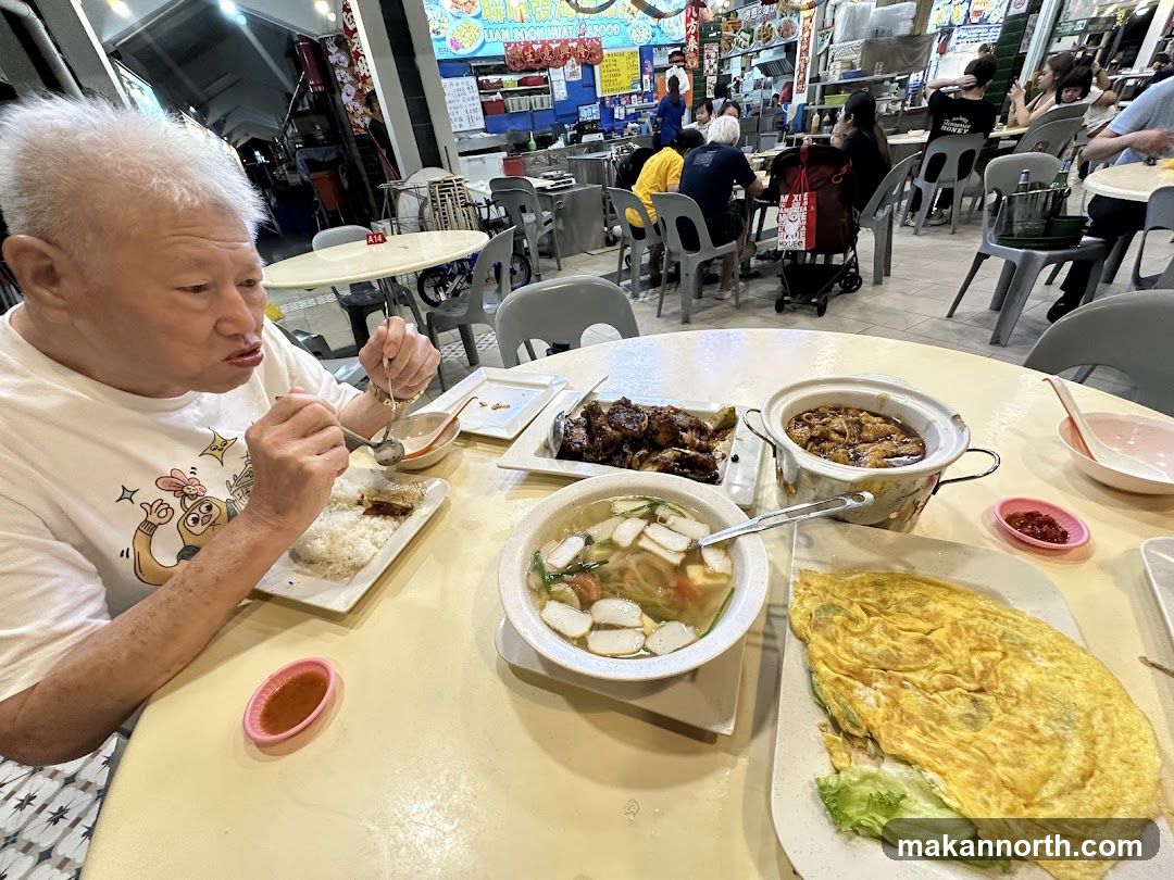 People eating at a food court