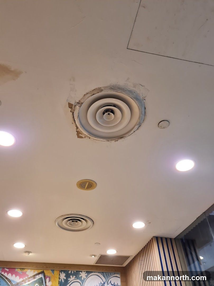 Ceiling with vents and lights
