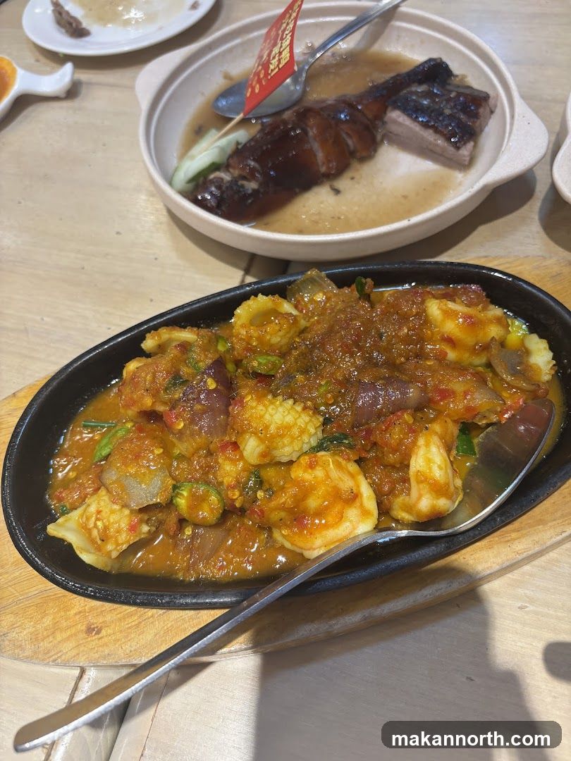 Sizzling Seafood and Roasted Duck