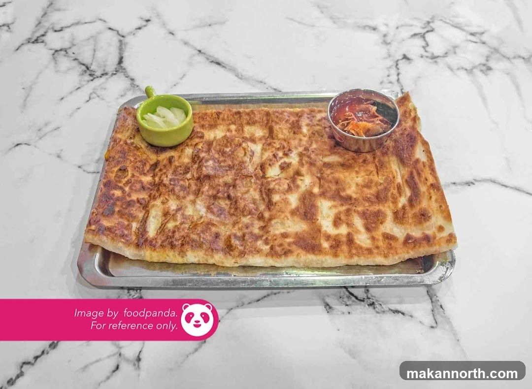 Roti Canai with Curry and Pickled Onions