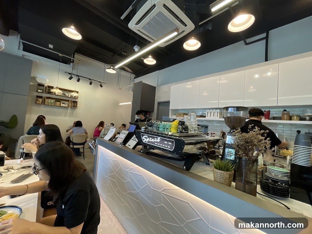 Cafe Interior with Barista and Patrons