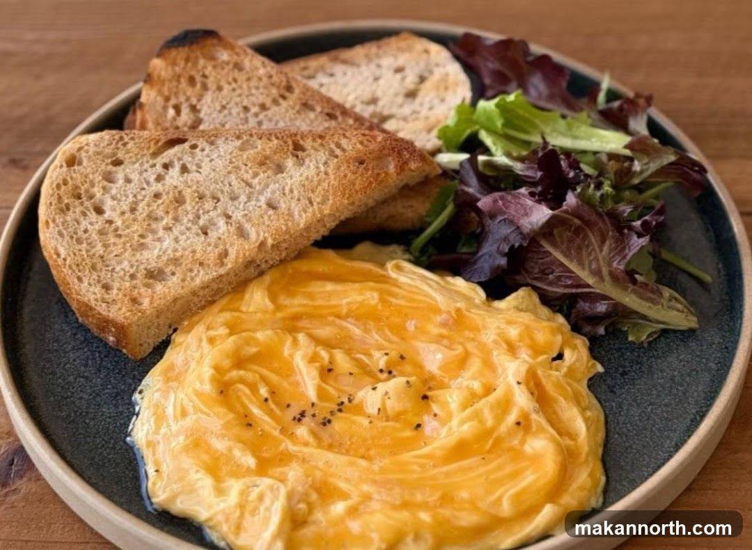 Scrambled Eggs with Toast and Salad
