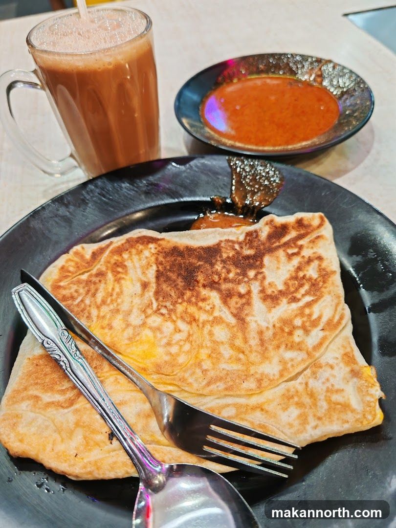 Roti Canai with Curry and Teh Tarik