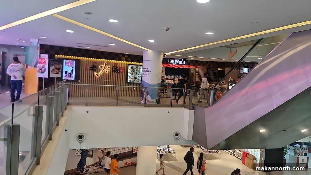 Mall Interior with Restaurants and Escalators