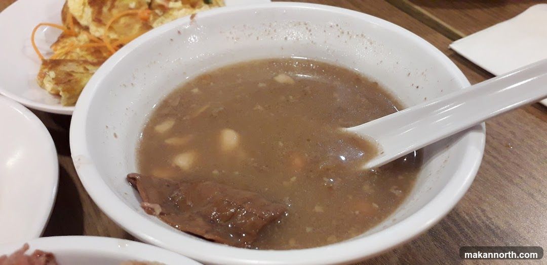 Bowl of Soup with Spoon