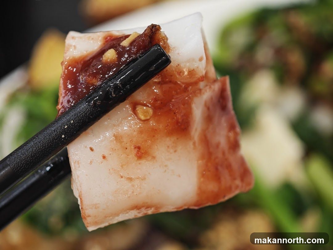 Close-up of food being held by chopsticks