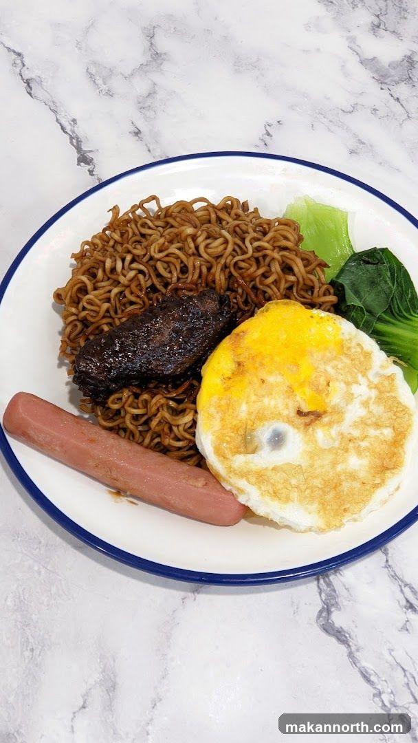 Noodles with Fried Egg, Sausage, and Meat