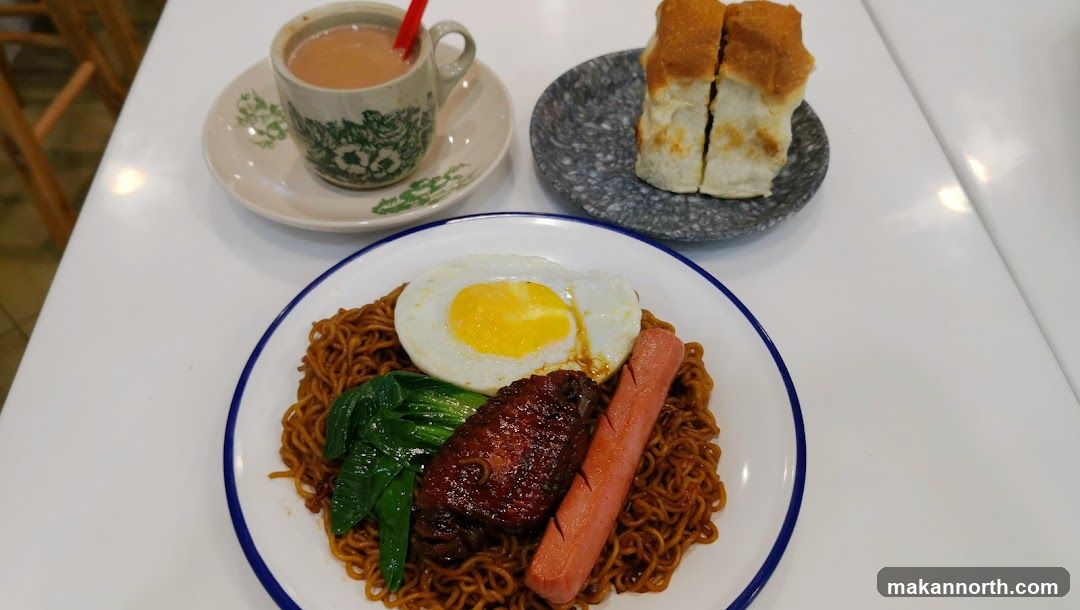 Noodles with Fried Egg, Chicken Wing, Sausage, and Toast