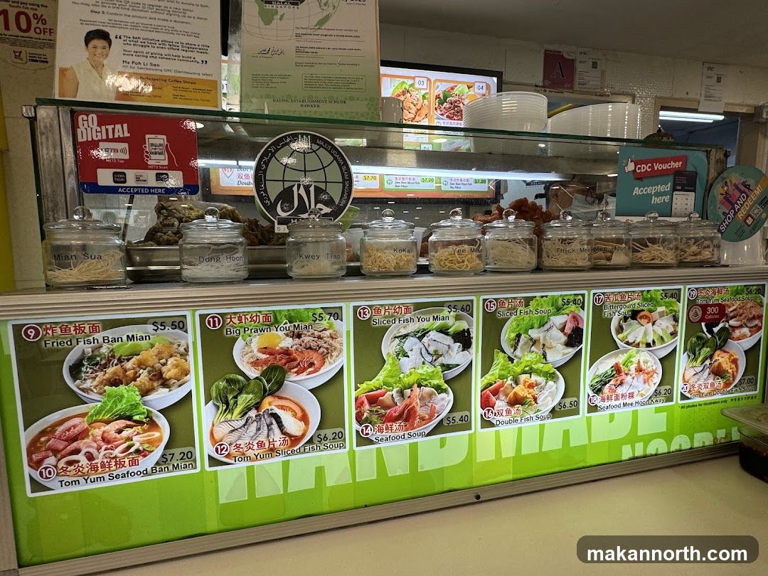 Food stall display with menu and ingredients