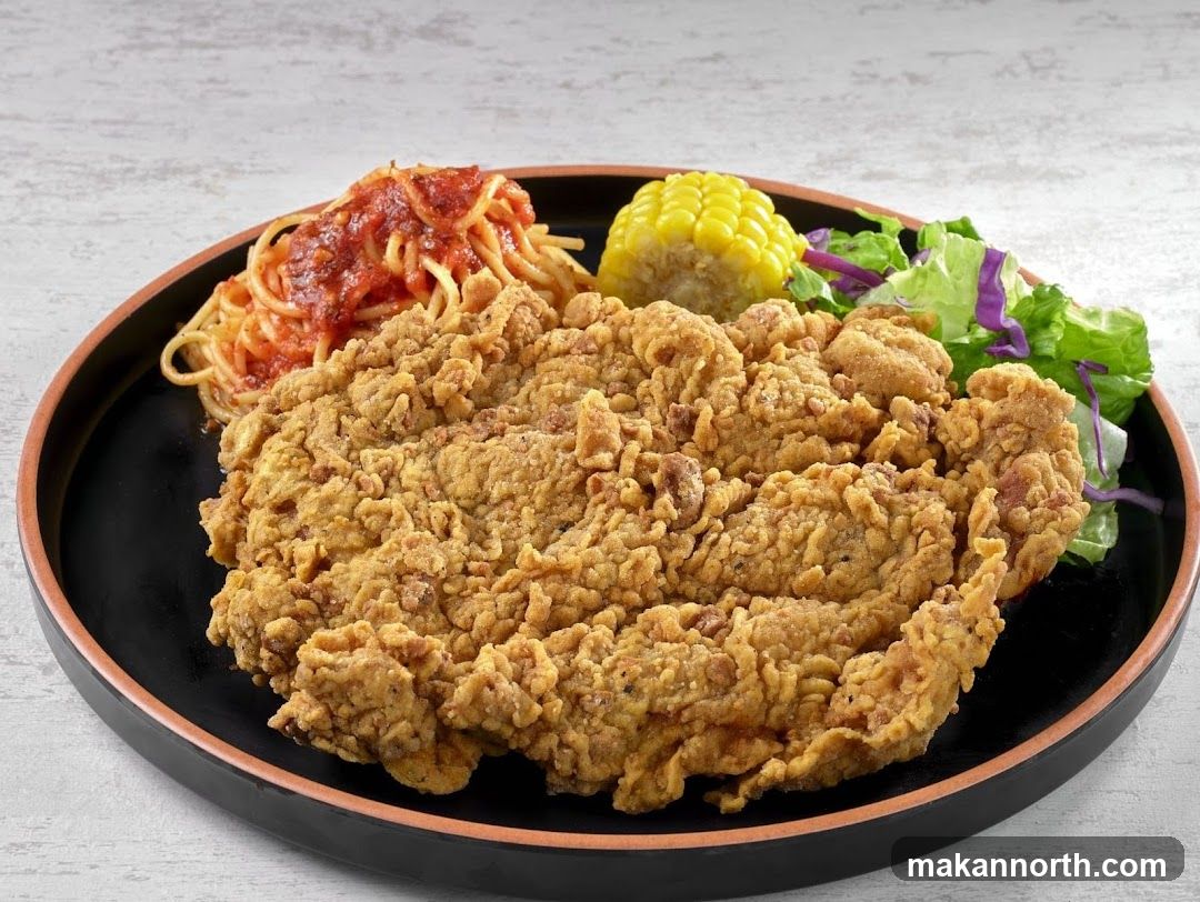 Fried Chicken Steak with Spaghetti and Corn