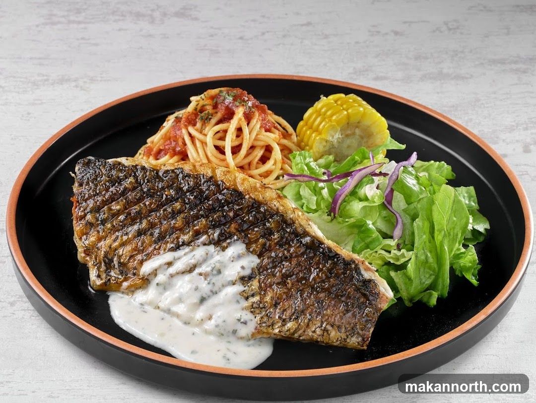 Fish Fillet with Spaghetti and Salad