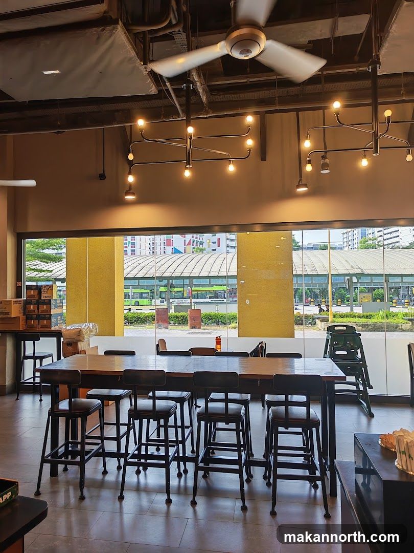 Cafe Interior with Large Table and Stools