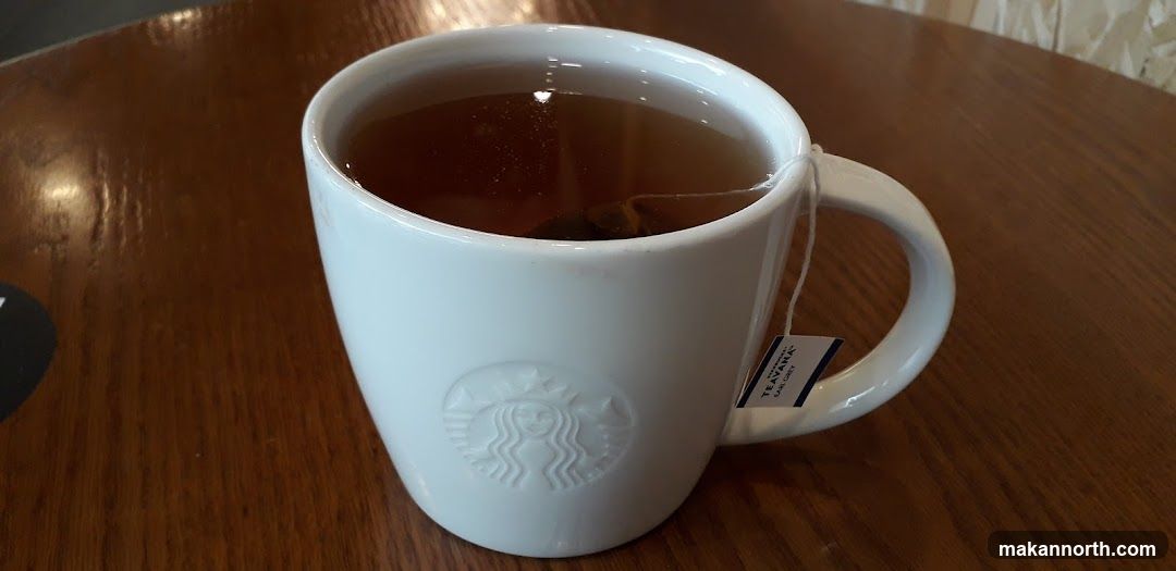 Tea in a Starbucks mug