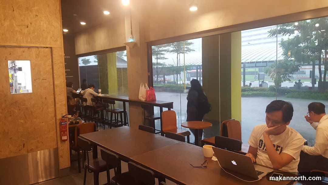 People working and relaxing in a cafe