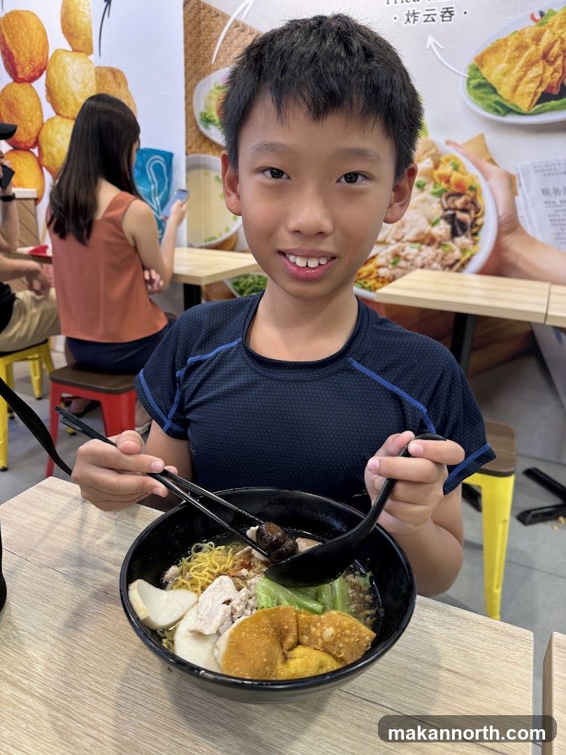 Boy Eating Noodles