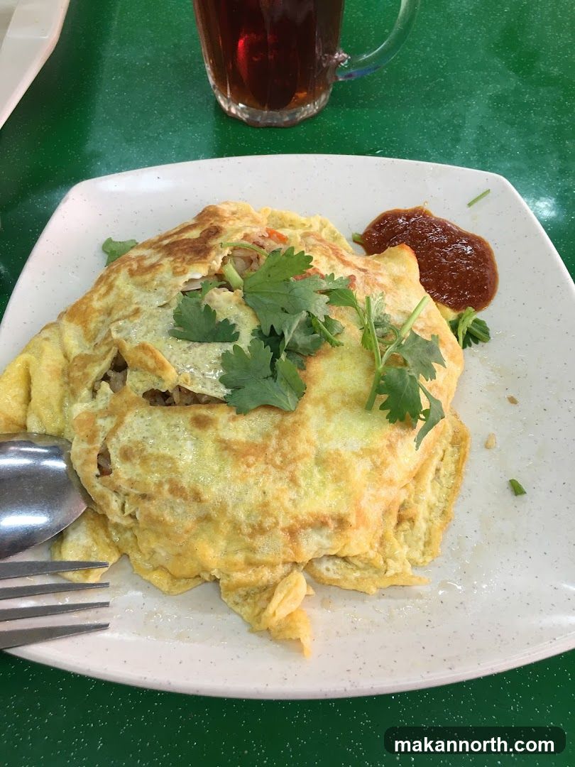 Omelette Rice with Chili Sauce and Tea