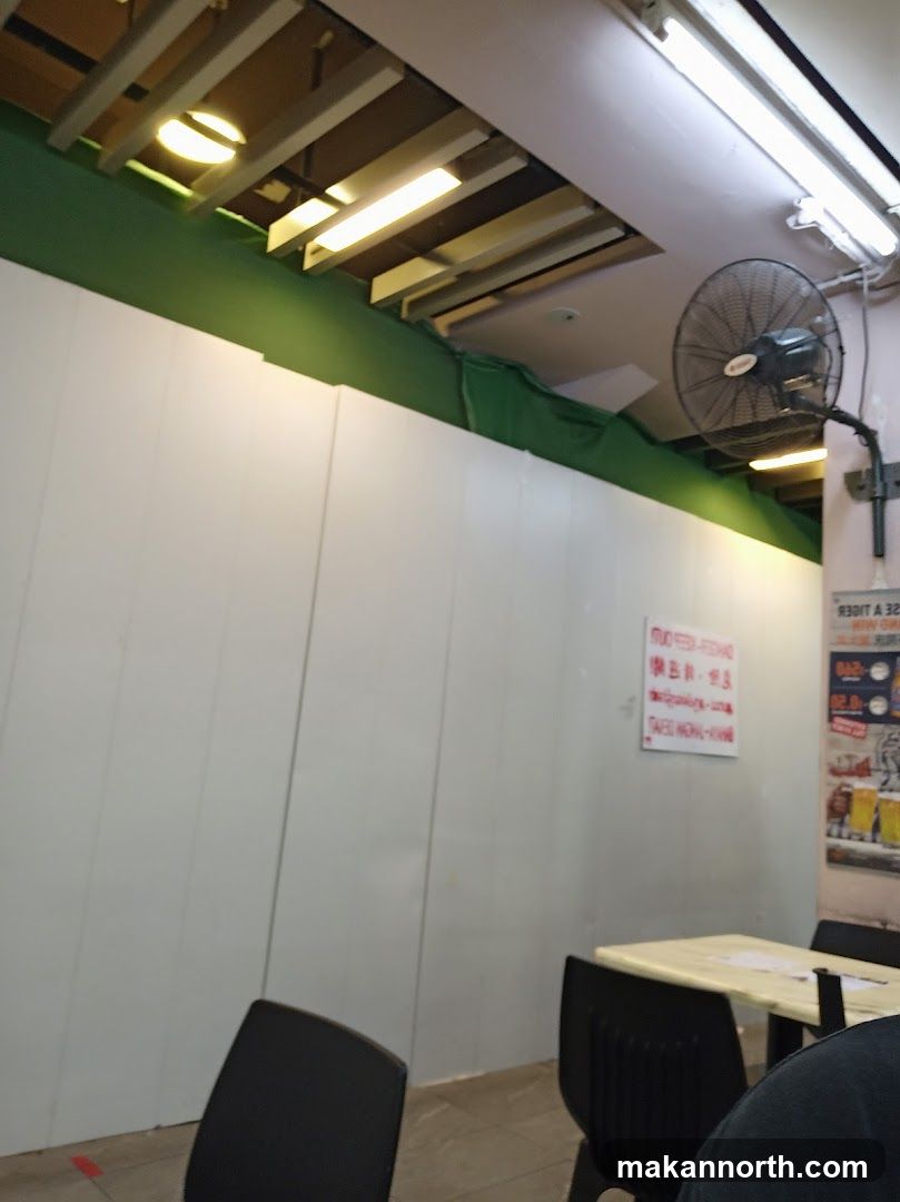 Restaurant Interior with Fan and Signage