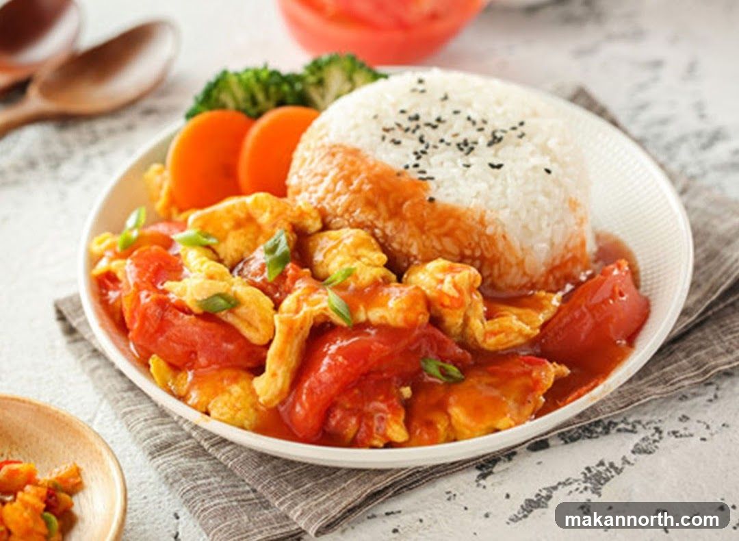 Scrambled Eggs with Tomatoes and Rice