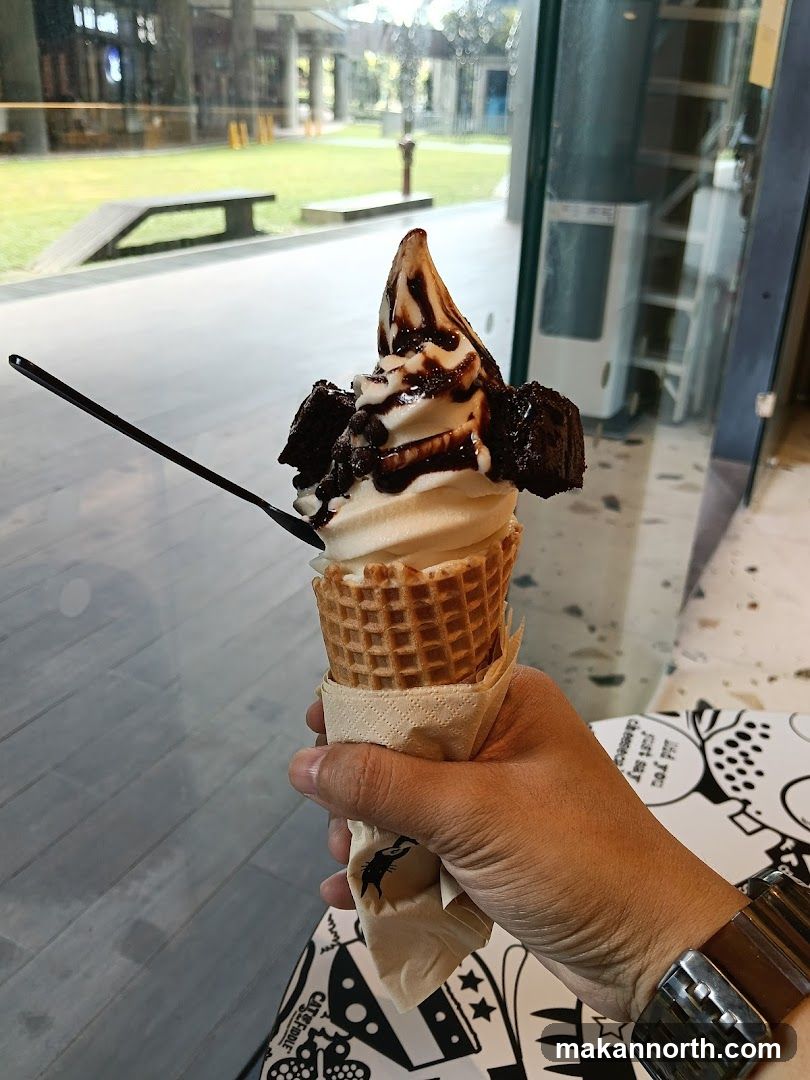 Ice Cream Cone with Brownies and Chocolate Drizzle