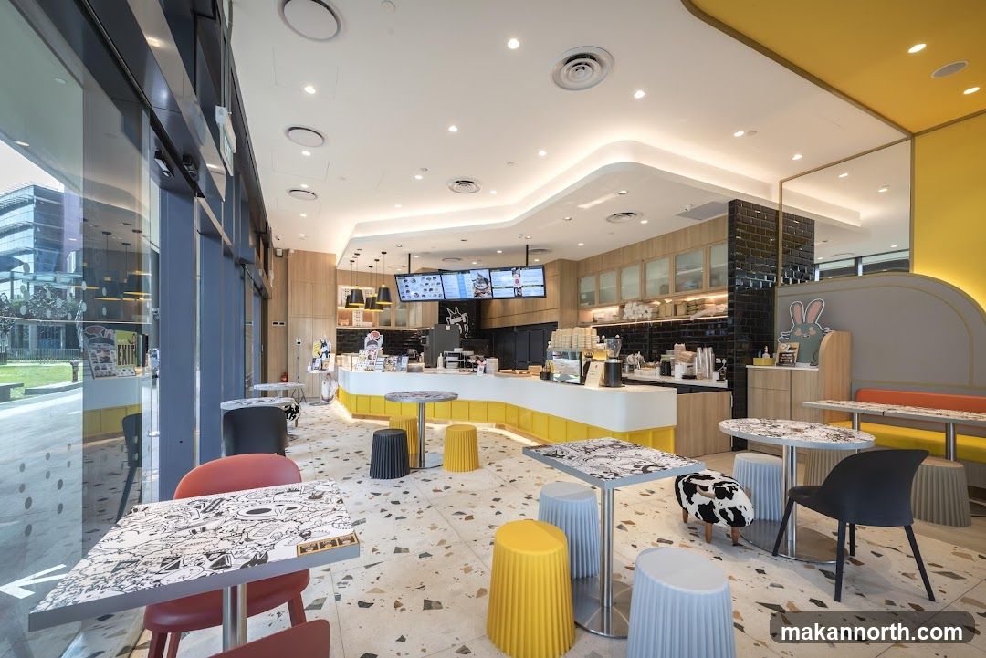 Modern Cafe Interior with Bright Yellow Accents
