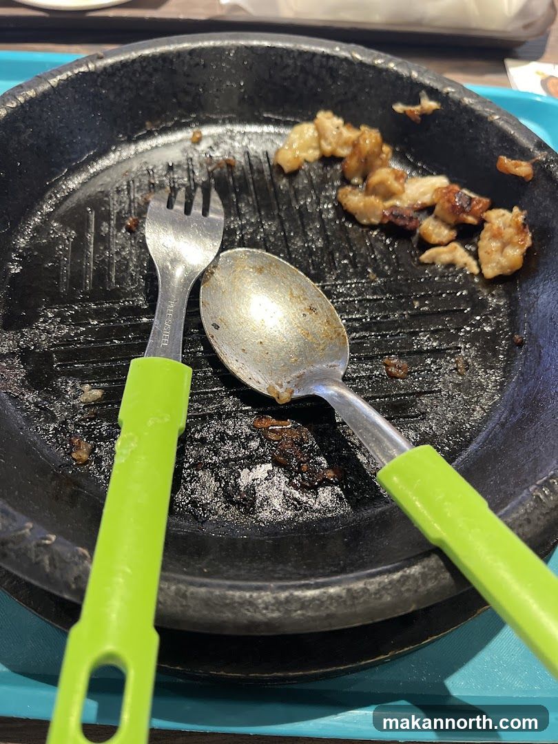 Dirty Griddle Pan with Leftover Food