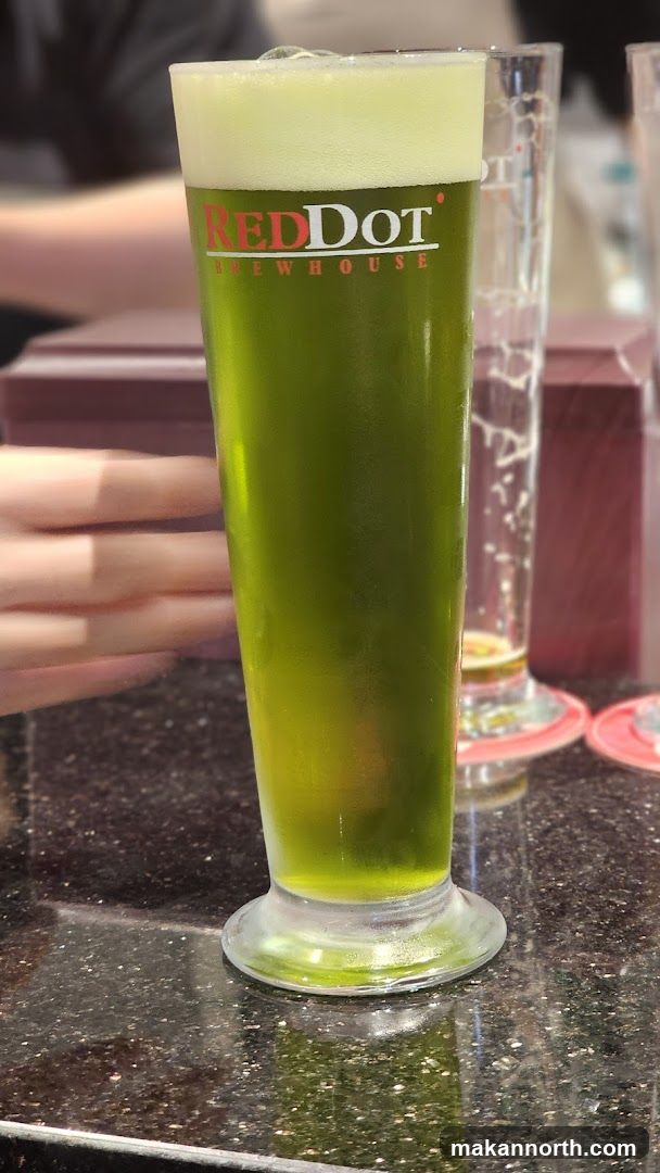 Green Beer with Red Dot Brewhouse Logo