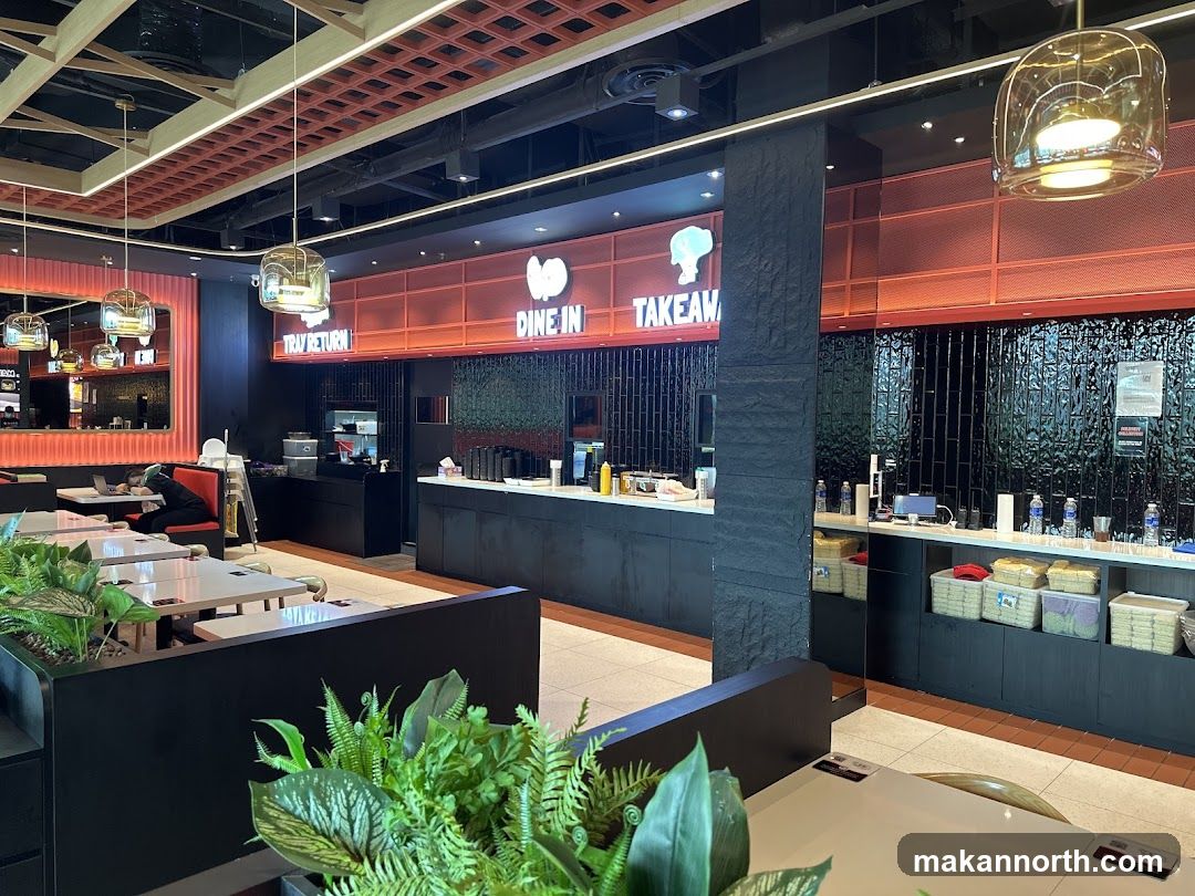 Restaurant Interior with Dine-In and Takeaway Signs