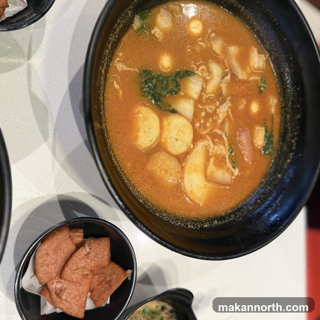 Spicy Soup and Fried Meat Slices