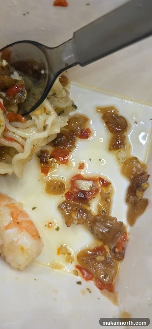 Close-up of a messy plate with food remnants