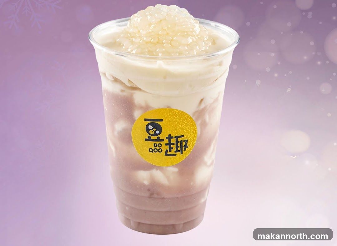 Purple layered drink with topping