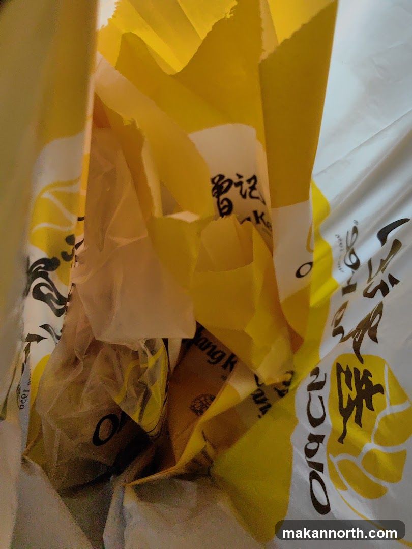 Yellow shopping bags with Chinese characters