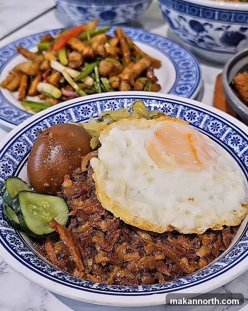 Rice dish with fried egg and side dishes