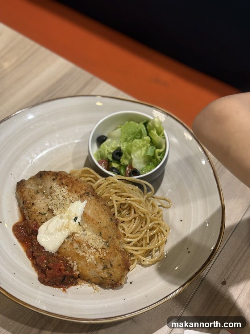 Breaded Fish with Spaghetti and Salad