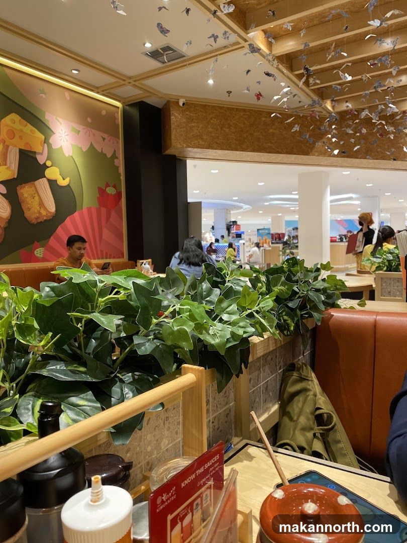 Restaurant Interior with Greenery and Artwork