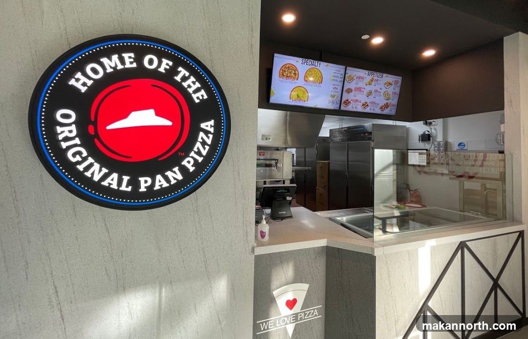 Pizza Restaurant Interior with Menu Boards