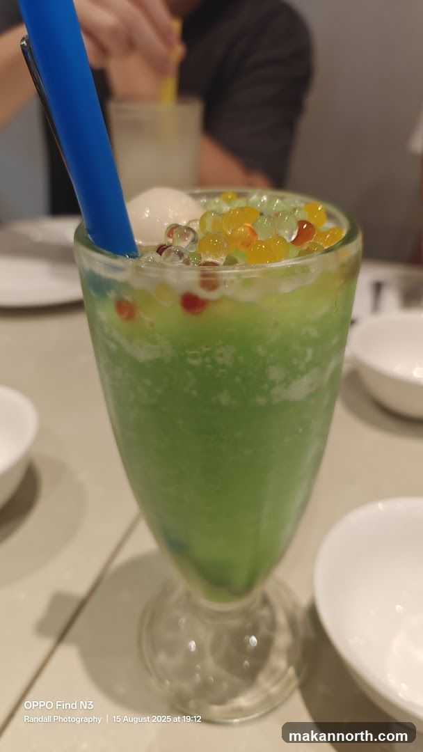 Green Slushy Drink with Toppings