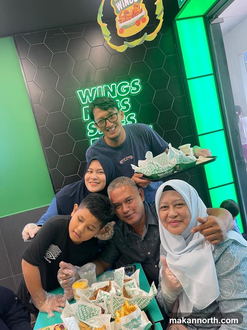 Family enjoying a meal at a restaurant