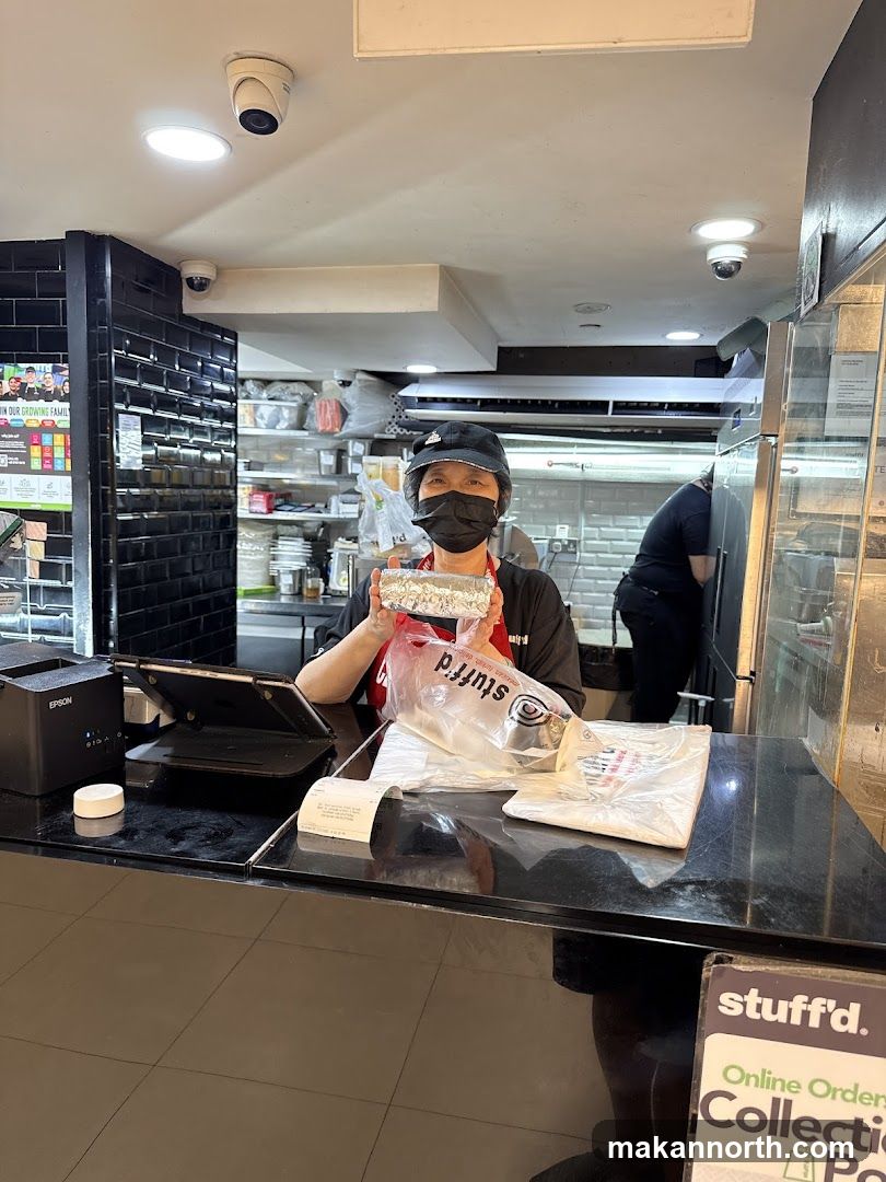 Staff holding food order