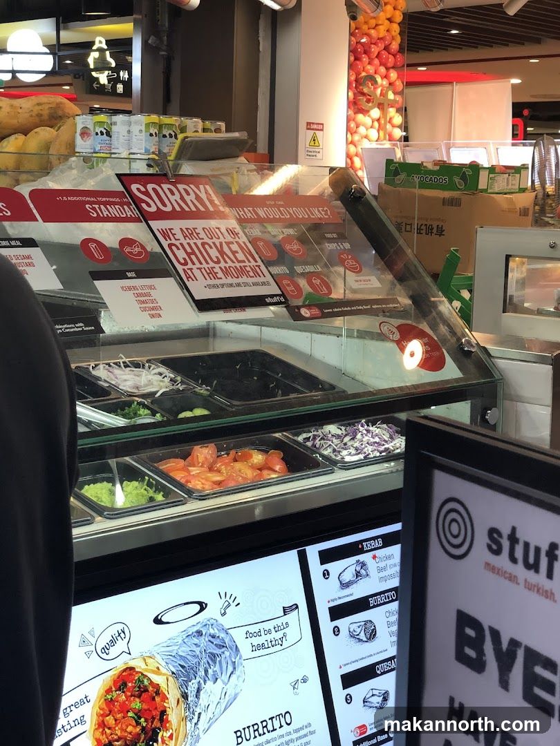 Food counter with menu and ingredients