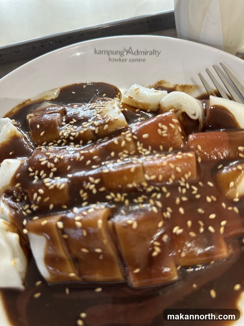 Chee Cheong Fun with Sauce and Sesame Seeds