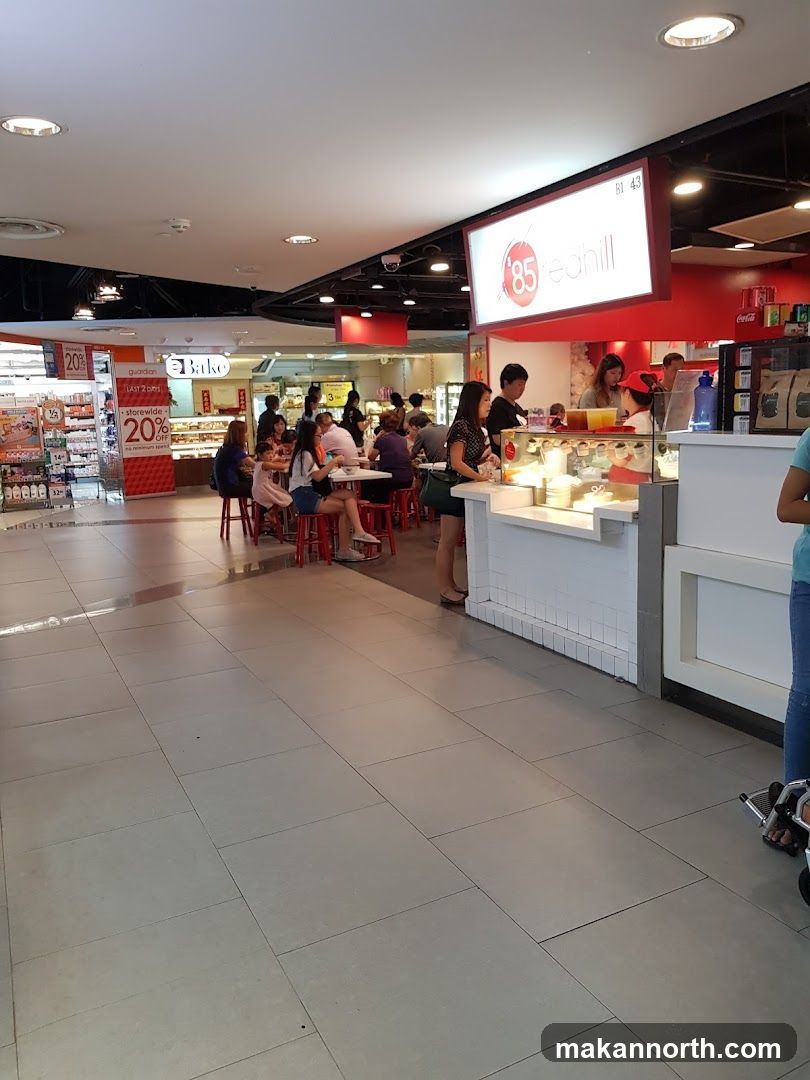 Food court with seating and food stalls