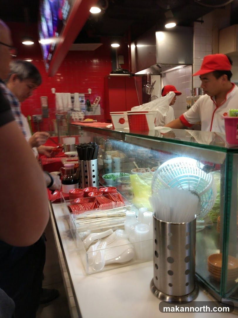 Restaurant Counter with Staff and Supplies