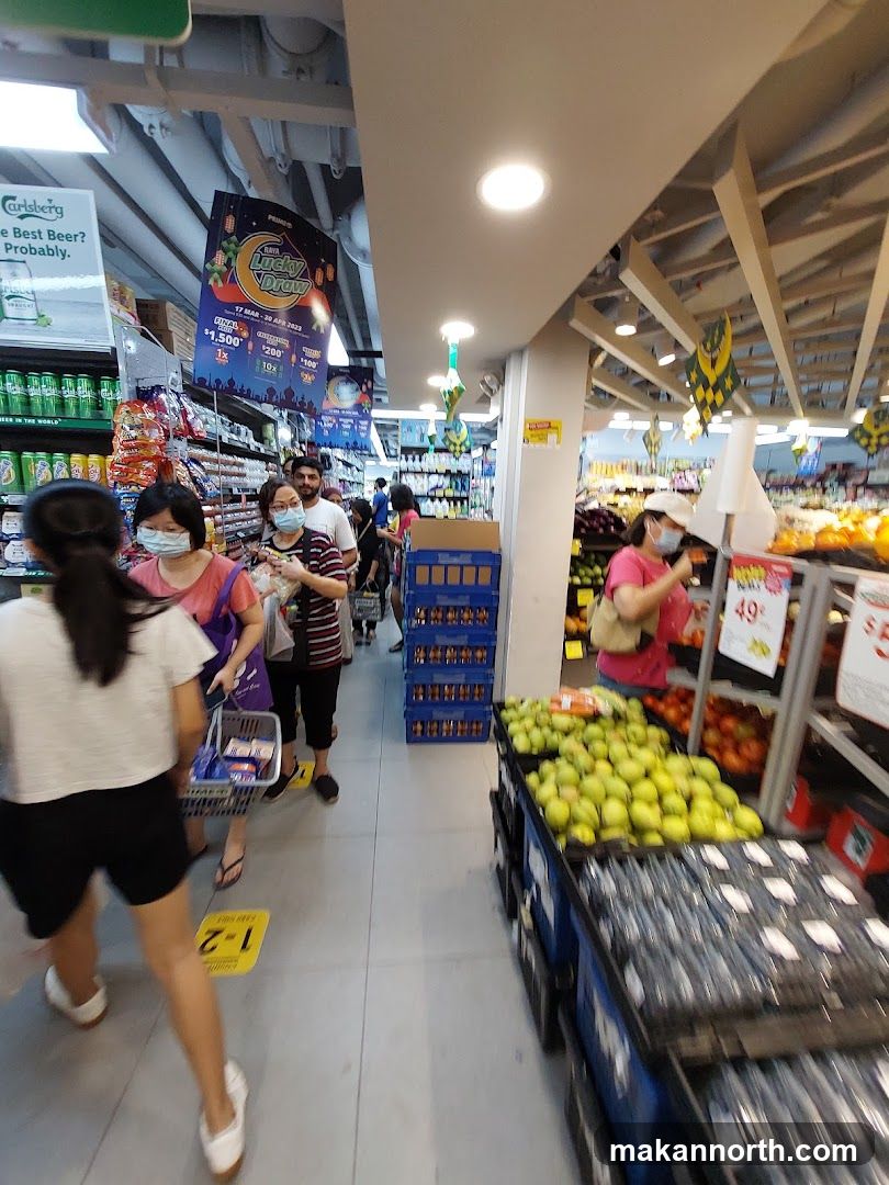 Supermarket Aisle with Shoppers
