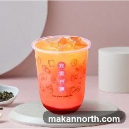 Fruit tea in a plastic cup