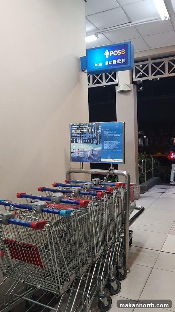 Shopping Carts and ATM Sign