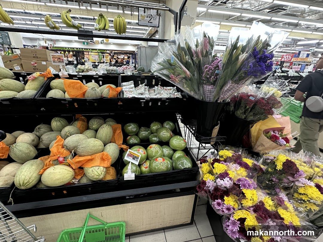 Produce and Flower Display in a Supermarket