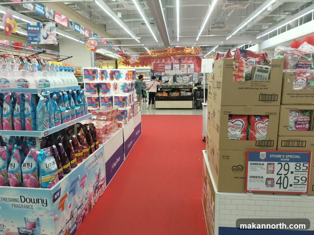 Supermarket aisle with cleaning supplies and beverages