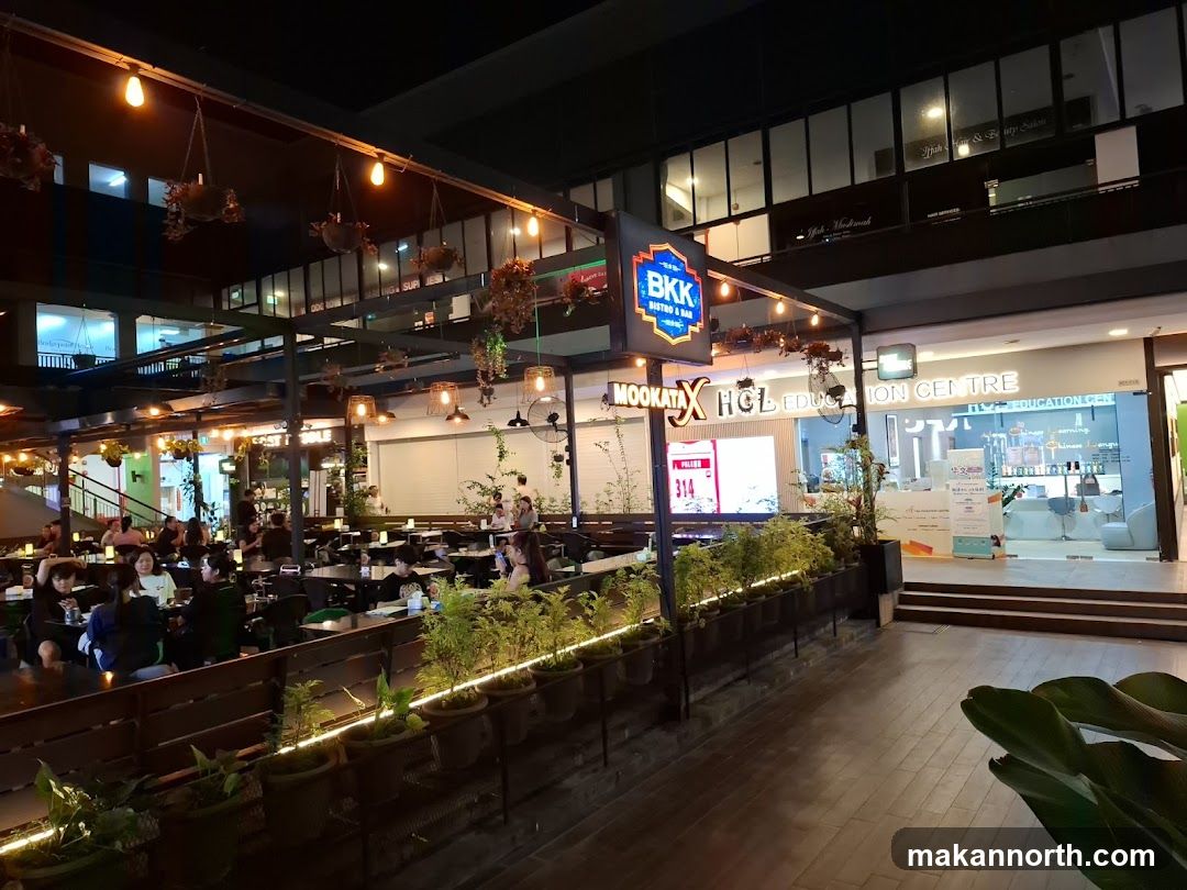 Outdoor dining area with a bistro and education center