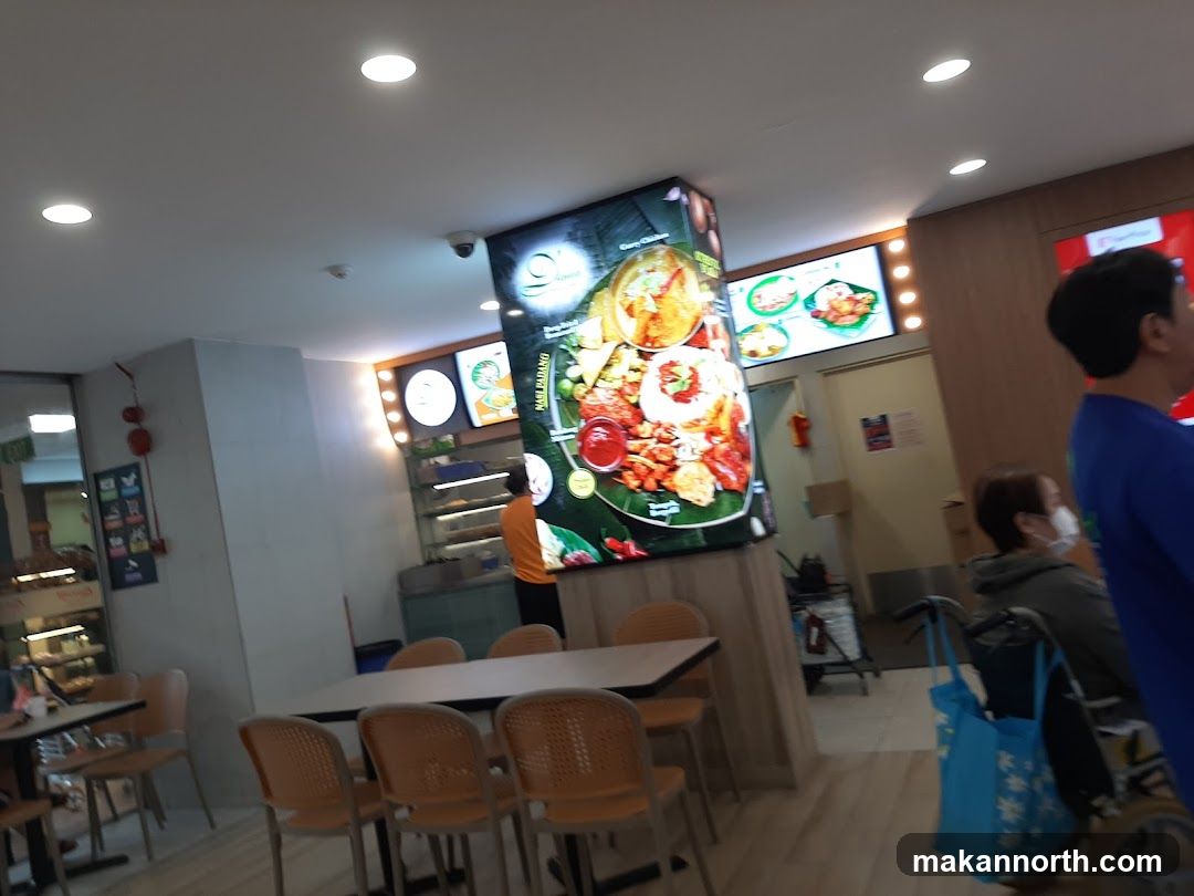 Food court with large illuminated menu